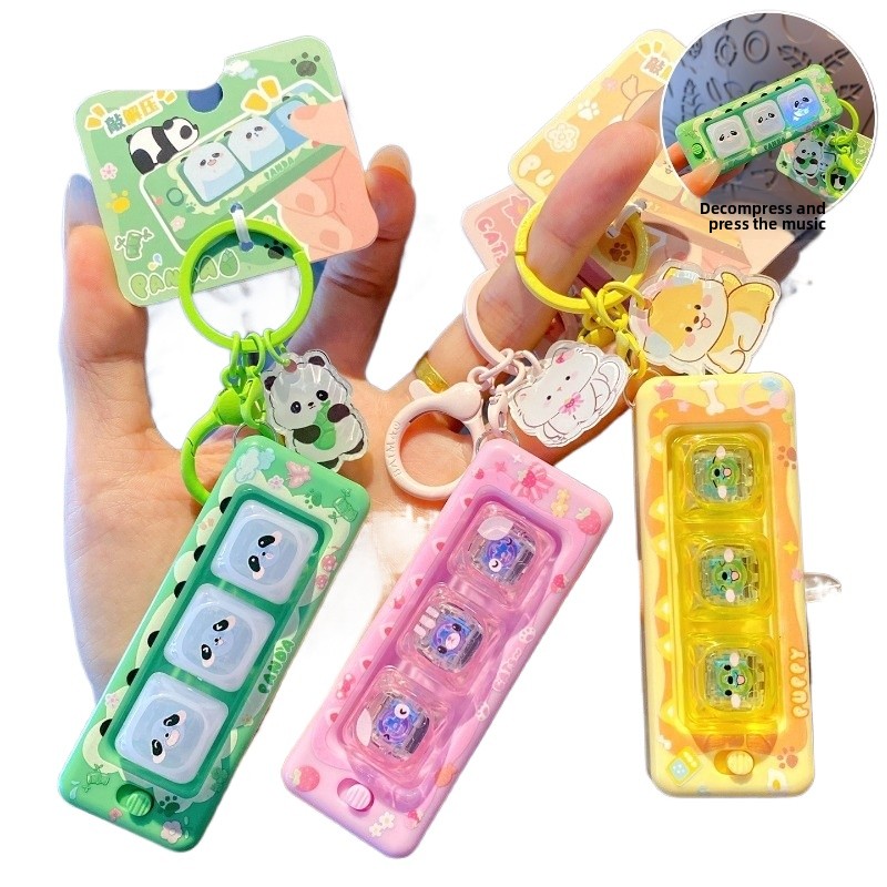 Pet Supplies Store - Original Niedlicher Haustier-Dekompressions-Tastatur-Whack-a-Mole-Schlüsselanhänger, Cartoon-Schüler-Spielzeug, Leuchtender Taschenanhänger